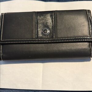Beautiful BlackClutch Wallet.  Never been used.  Plenty of room.